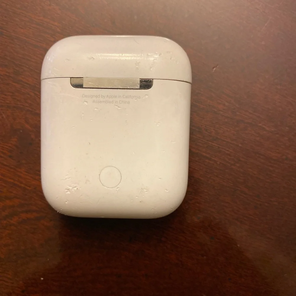 Apple AirPods First Generation charging cable and charging case.No AirPods